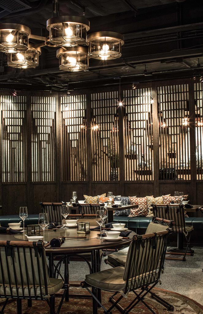 Mott 32 Hong Kong restaurant table and lamps